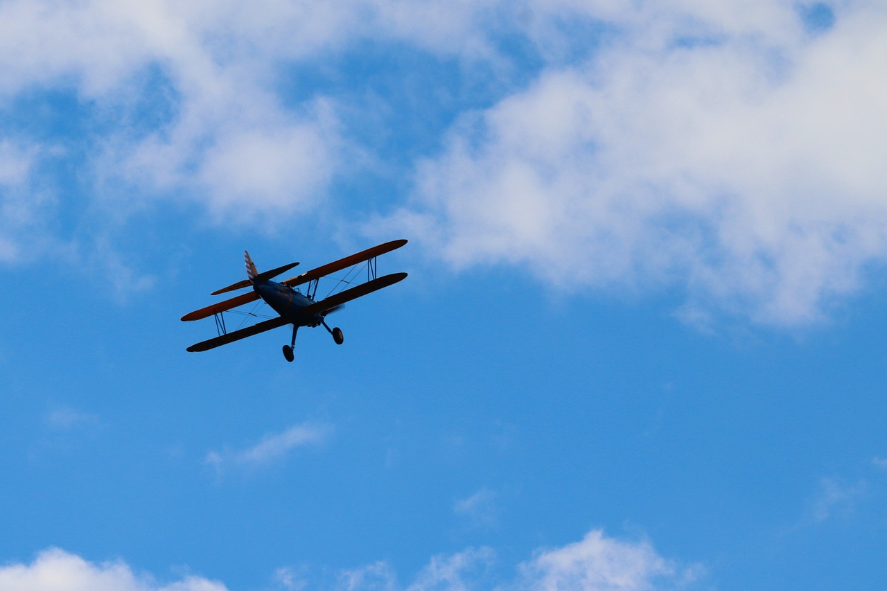 aircraft, biplane, nature, fixed-wing aircraft, old-fashioned aircraft, old-fashioned airplane, vintage aircraft, vintage airplane, flying, sky, cloudy sky, blue sky